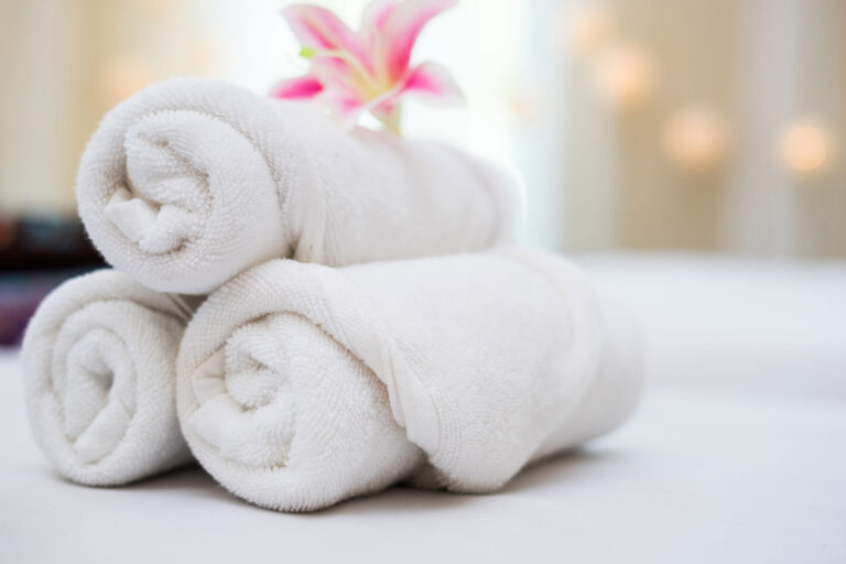 beautiful-pink-orchid-white-towel-spa-salon